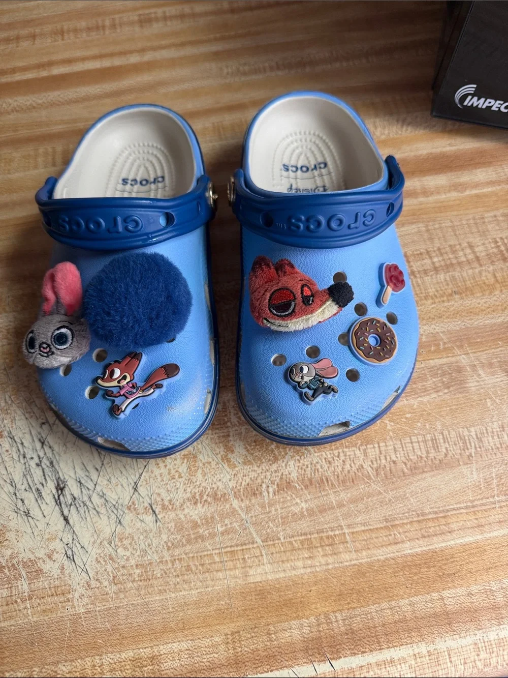 CROCS Kids Light Blue Classic Clogs with Fun Charms